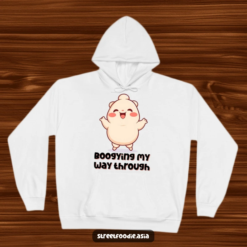 Funny Hoodie depicting a smiling dumpling character ecstatically doing a silly jig, offering comfort and a playful vibe.