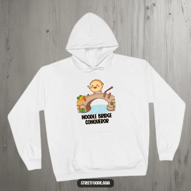 Funny hoodie with a smiling empanada leaping over a steaming noodle bridge, radiating warmth and a sense of adventurous spirit.