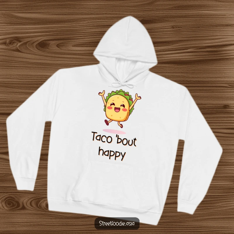 Funny Taco Jump Hoodie featuring a happy taco character mid-jump, offering warmth and festive humor. Comfortable and fun.