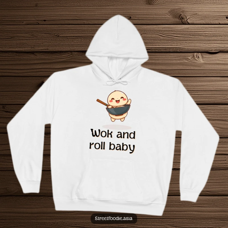Funny hoodie with a playful dumpling happily spinning a miniature wok, radiating warmth and culinary charm.