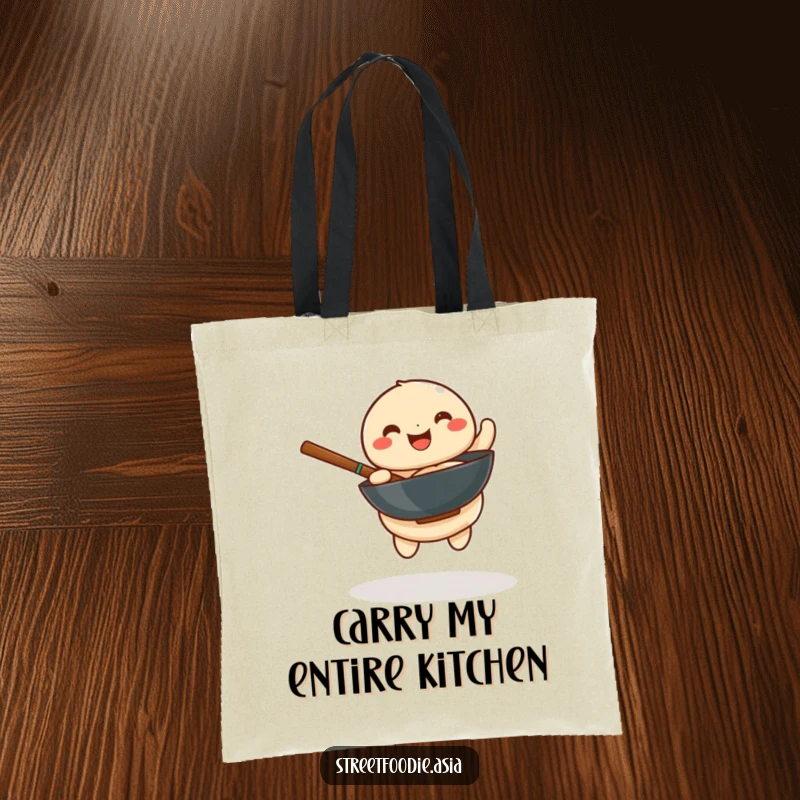 Funny tote bag featuring a playful dumpling joyfully spinning a miniature wok, designed for carrying items with a humorous touch.