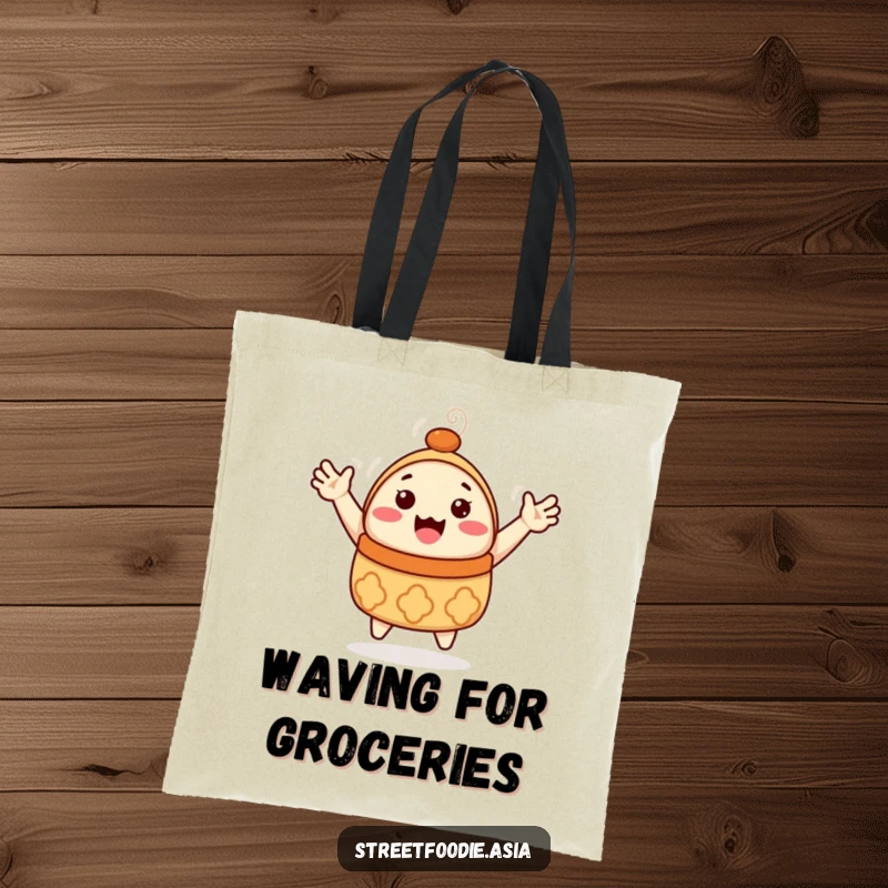 Funny Dim Sum Tote Bag: A tote bag featuring a happy dim sum character with tiny arms waving. Practical and humorous, a funny gift.